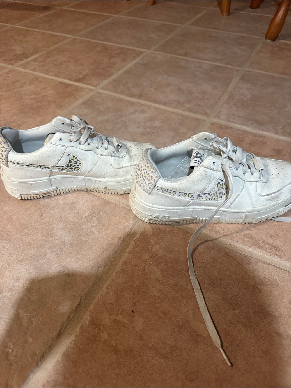 Nike White Low-Top Sneakers with Leopard-Print Swoosh